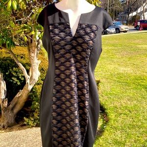 Connected apparel size 12 with silver design in the front length midi NWT